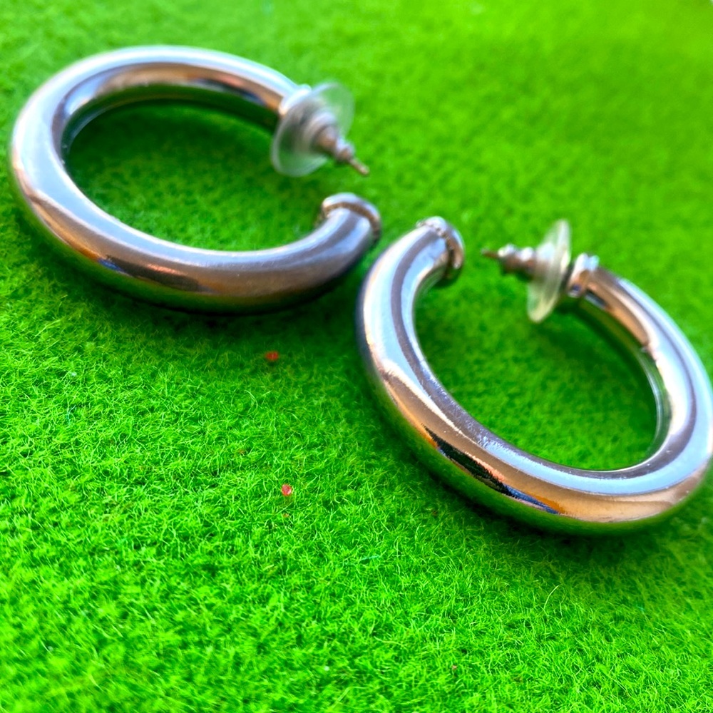 Sterling? Silver plated? Large hoop earrings